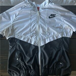 Grey and white Nike windbreaker